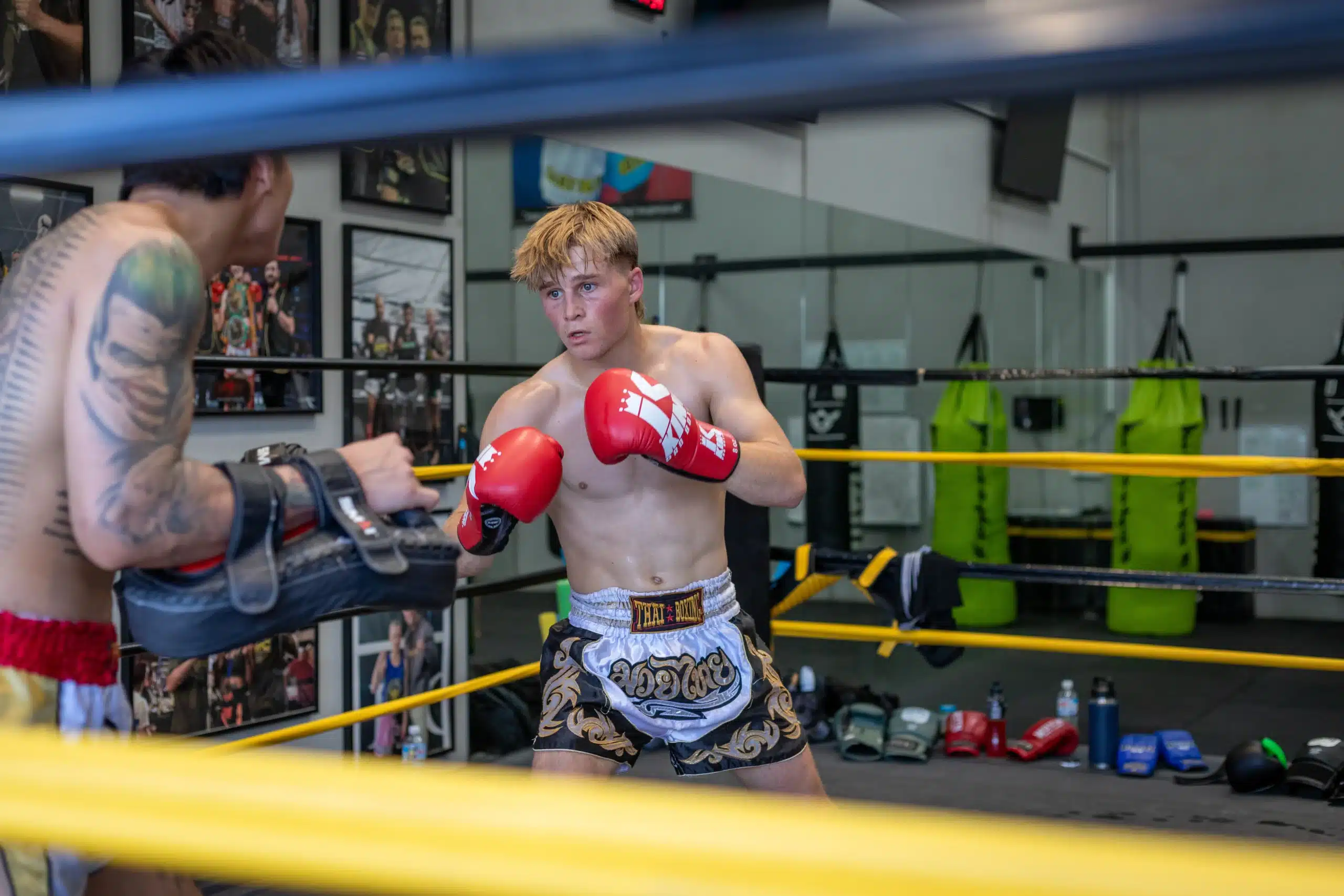 Cool Heart fighter working the pads in the ring